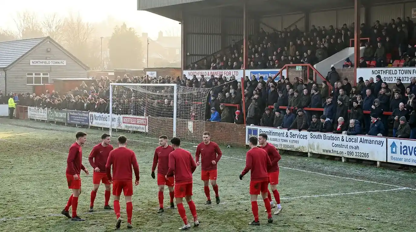 FA Cup third round tie between a Premier League side and a League One club at a packed lower-tier ground