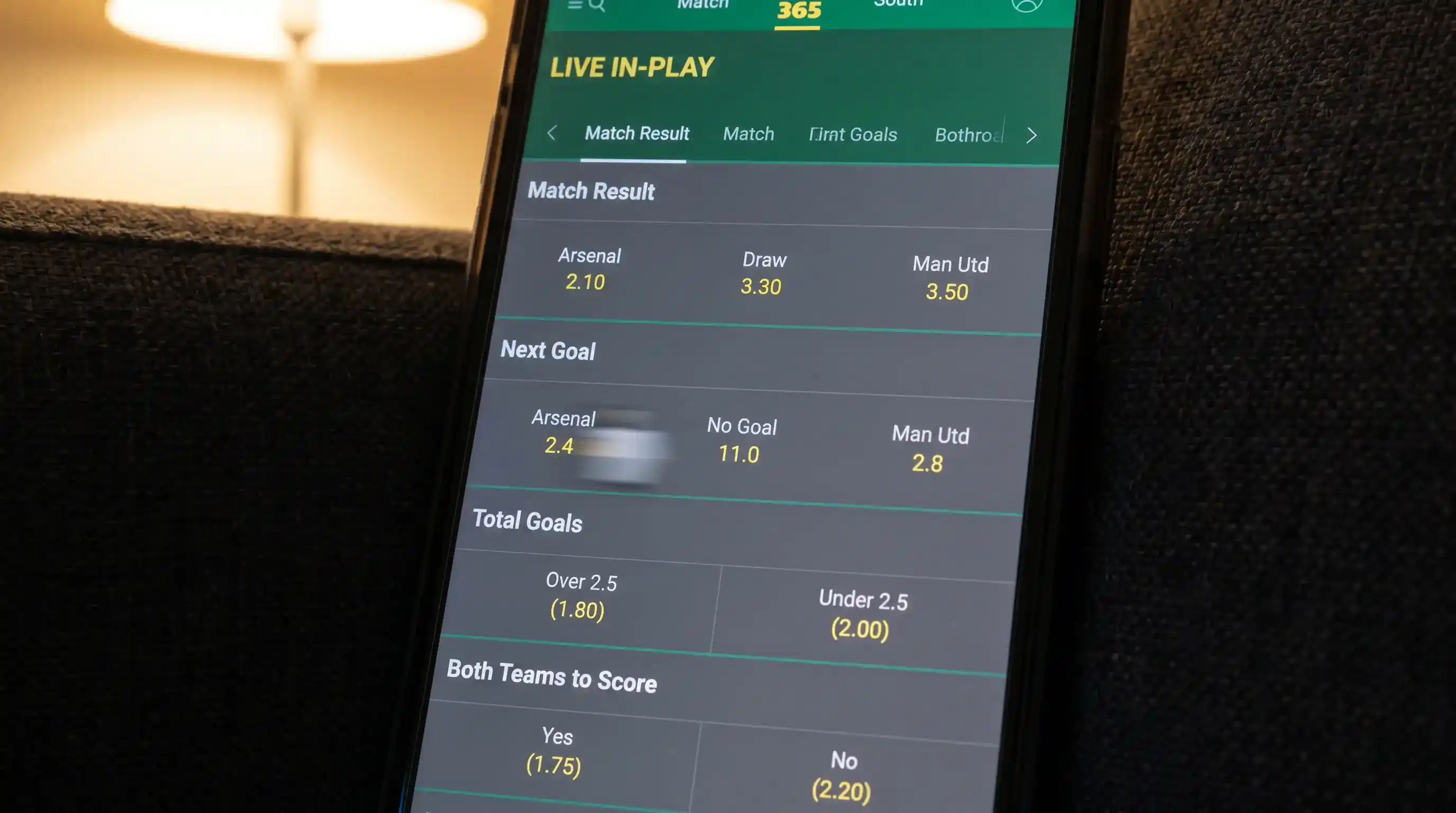 Live in-play football odds shifting on a bookmaker app as a Premier League match unfolds
