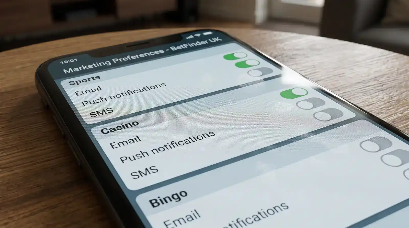 UK bookmaker app marketing preferences screen showing channel-by-channel opt-in toggles