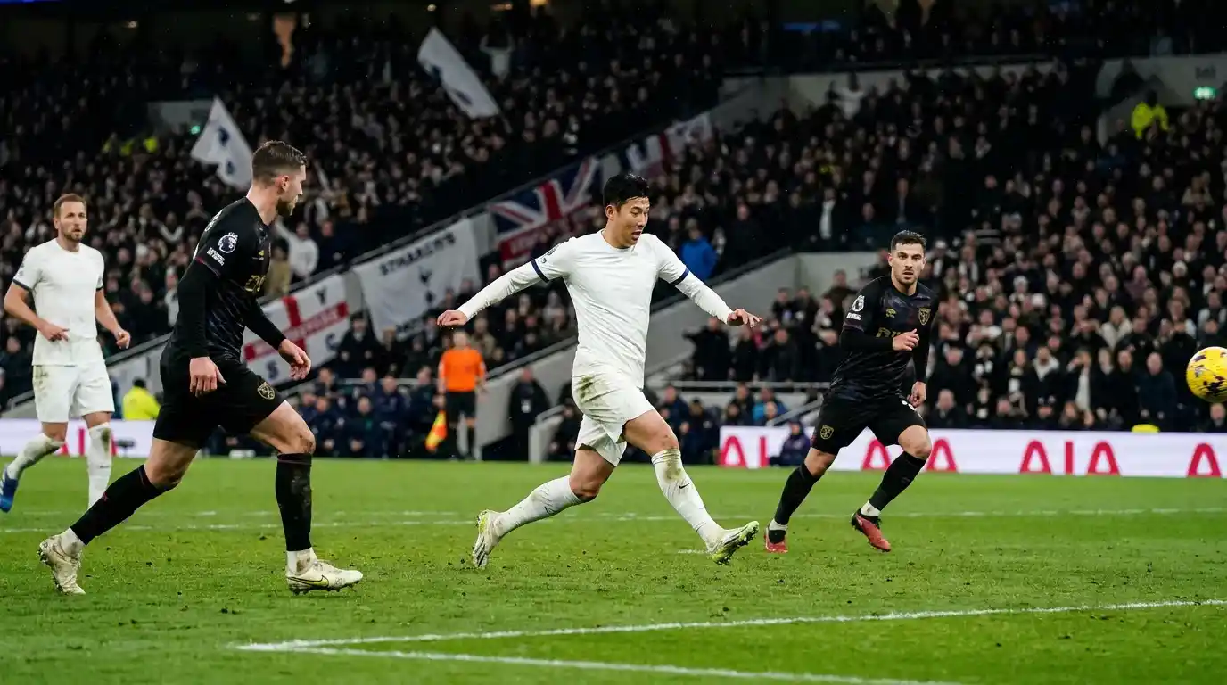 Attacking midfielder arriving late into the penalty area during a Premier League match to attempt a shot