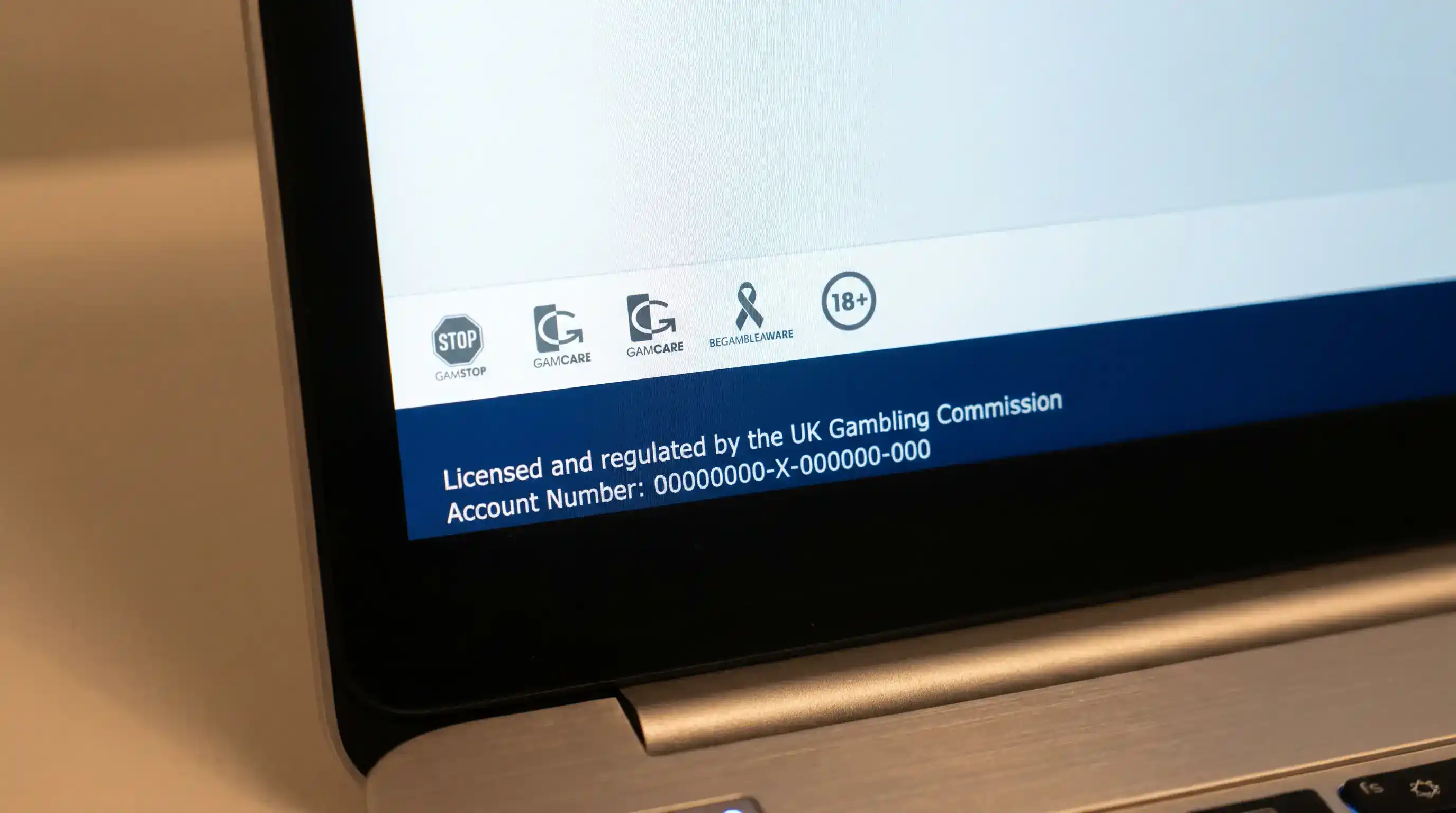 The footer of a UK bookmaker website showing the UK Gambling Commission licence number and regulatory statement